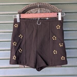 Black Shorts with Gold Accents